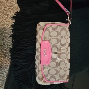 COACH Wristlet w/pink trim.